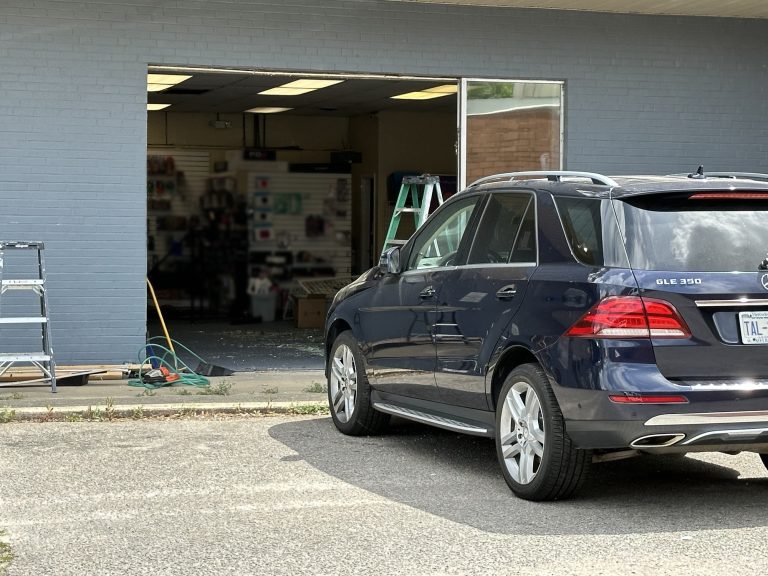 Vehicle smashes into Southern Pines business
