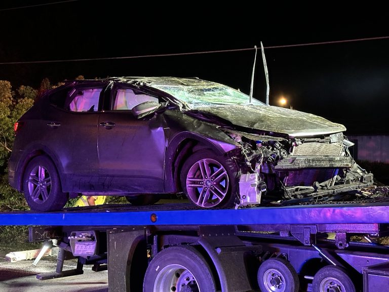 Car overturns on Highway 690