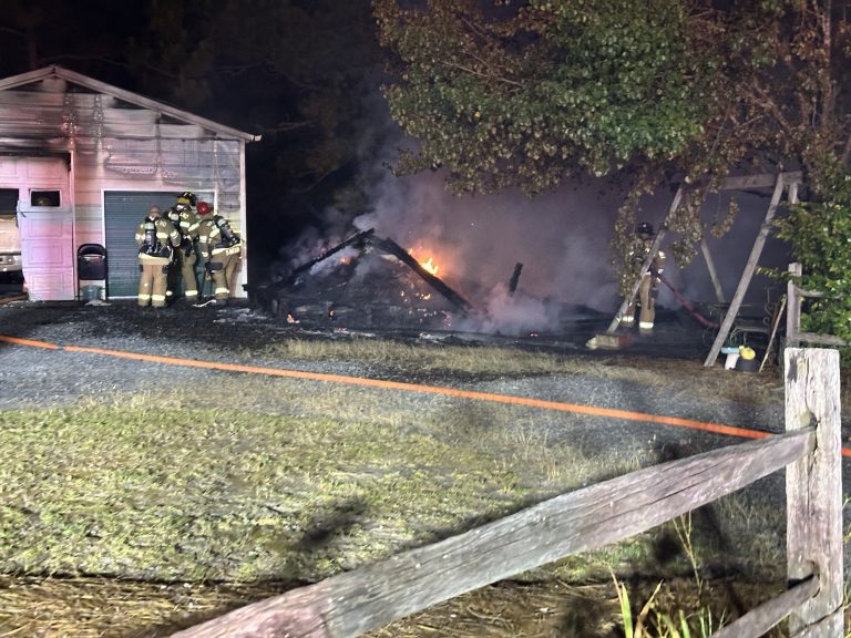 Fire damages 3 buildings, a truck, and motorcycle in West End