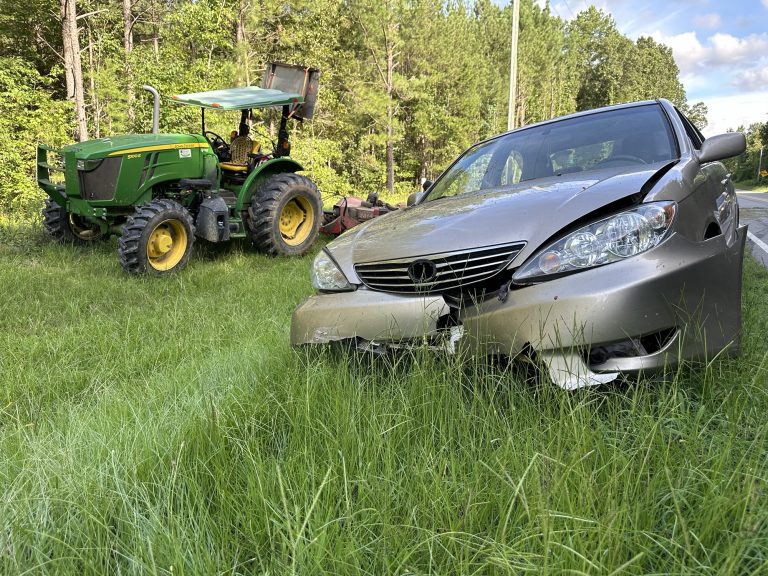 Car crashes into mower along N.C. 22