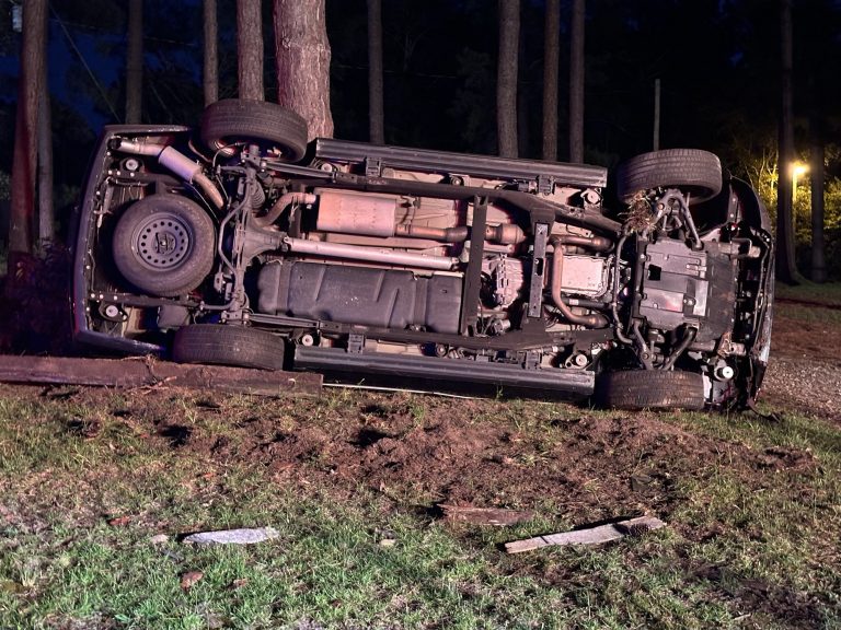 Local man overturns Escalade, arrested at scene