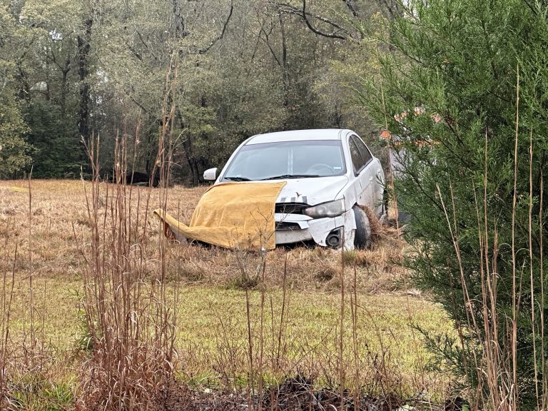 One person transported to hospital after spinning out on slick road