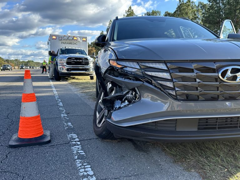 Crash causes traffic back up in Seven Lakes