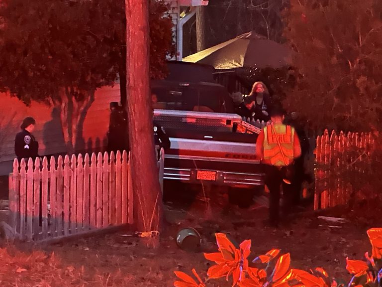 Unoccupied truck hits house in Pinehurst