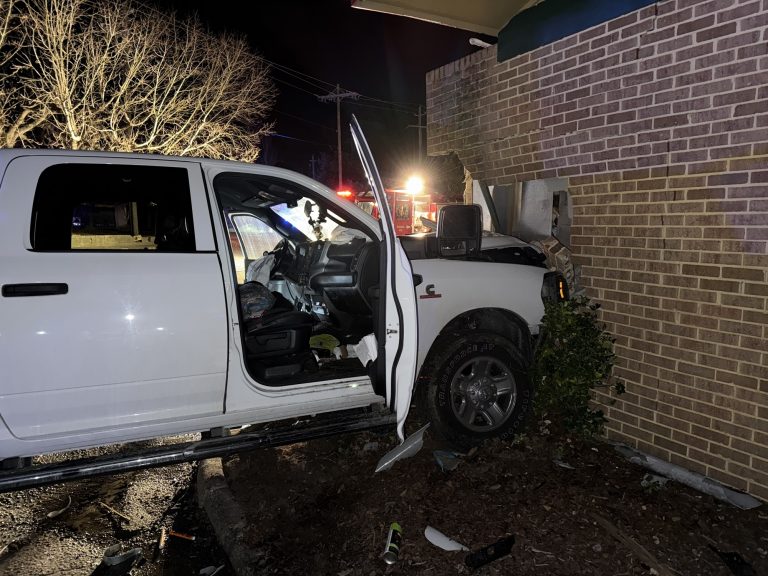 Truck crashes into Mac’s Breakfast after going through power pole