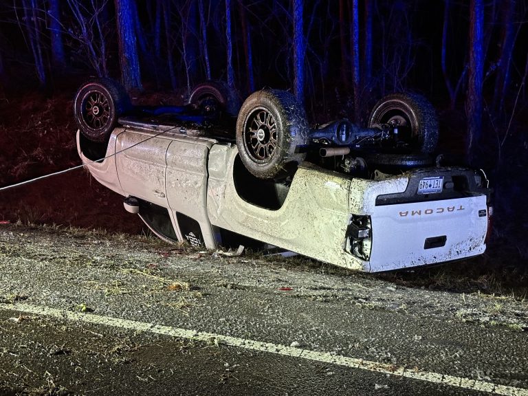 Truck overturns on icy Highway 24-27 curve