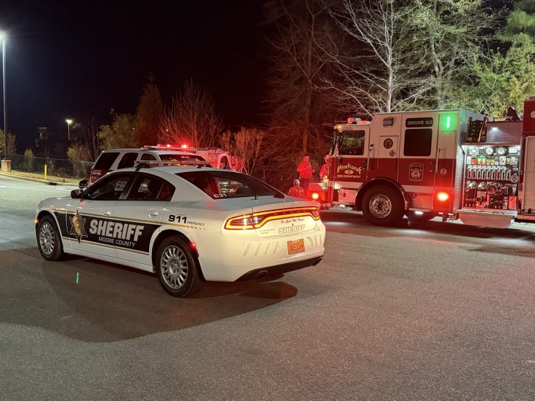 Outside fire intentionally set behind grocery store