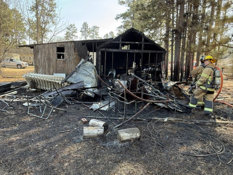 Flames from burn pile move to storage shed