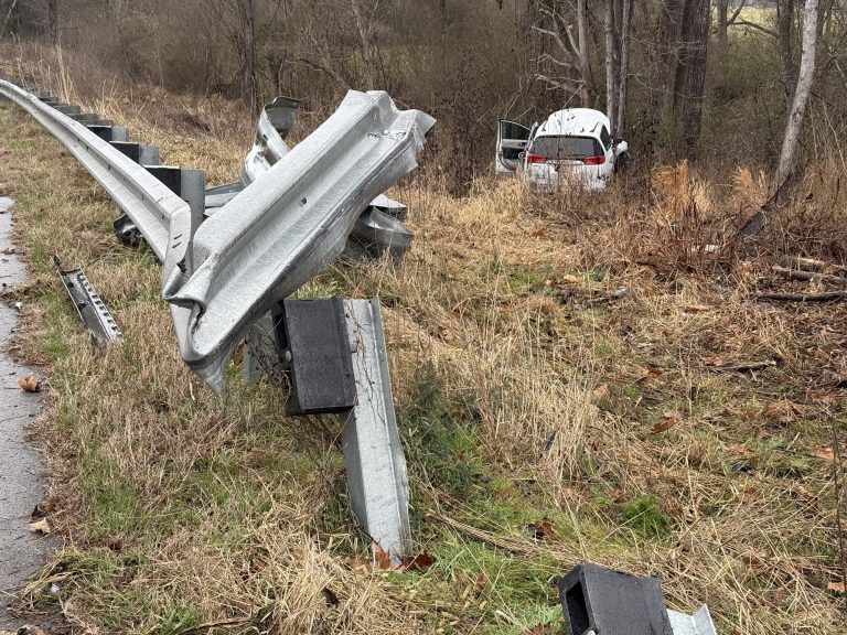 Minivan crashes through guardrail near Robbins
