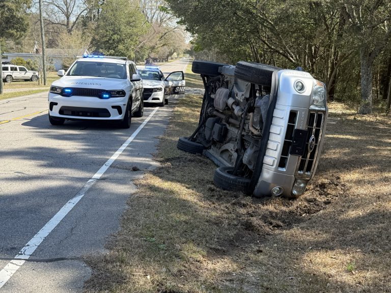 Pregnant woman hospitalized after vehicle overturns on Highway 73