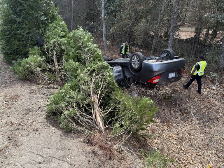 Vehicle overturns in Highway 211 crash