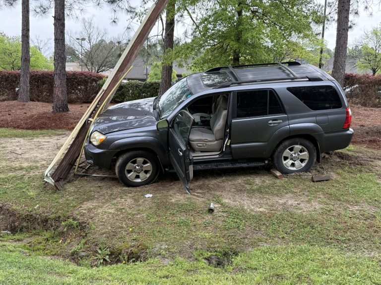 SUV splits power pole during Whispering Pines crash