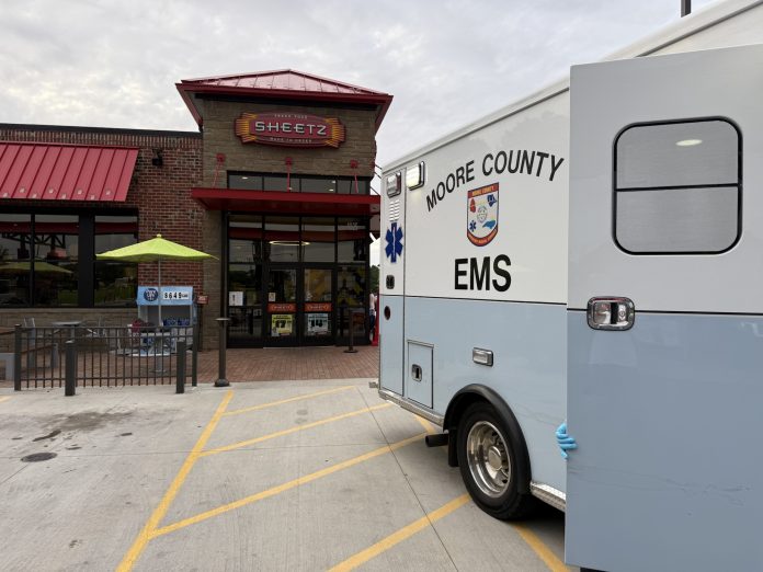 Paramedics respond to pedestrian struck by vehicle in Sheetz parking lot. (Patrick Priest)